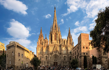 Barcelona, Spain - September 25, 2015: Cathedral of the Holy Cross and Saint Eulalia in Barcelona, Spain at sunset. Unidentified people present on picture. - 143578352