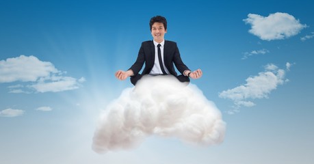 Fototapeta na wymiar Digital composite image of businessman on cloud