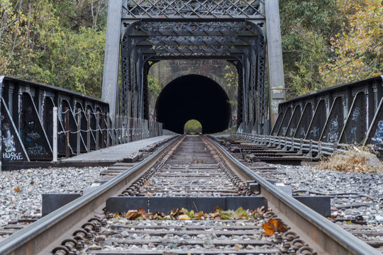 Train trestle leading to tunnel