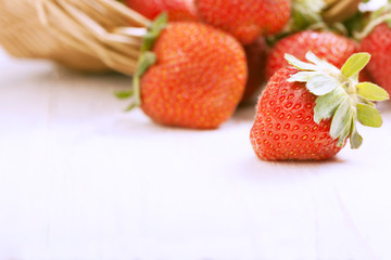 basket with strawberry on table