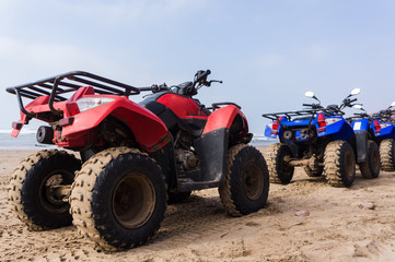 ATVs on the beach, Legzira, Morocco © Suzanne Plumette