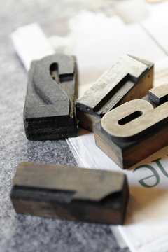 Old printing characters in wood and lead used as decorative object