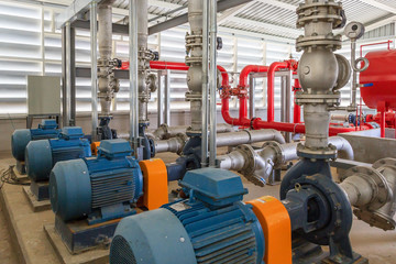 Industrial fire pump station for water sprinkler piping and fire alarm control system. Pipelines,...