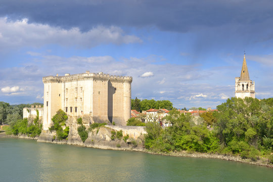 View to King Rene's castle and St Martha's Church from Rhone river in Tarascon, France