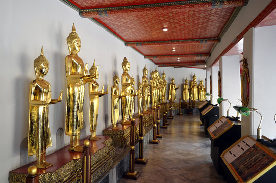 Sculptures depicting Buddha in the gallery of the temple.