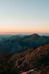 Naklejka na ściany i meble Mountains in Montenegro in the sunset light.