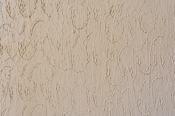 Texture of painted plaster wall relief inside, abstract background