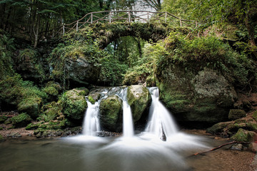 Fototapeta na wymiar Mullerthal Trail, Schiessentumpel Waterfall, Luxembourg