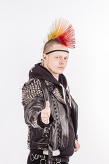 Portrait of punk rocker with Mohawk giving hand for handshake on a white background.