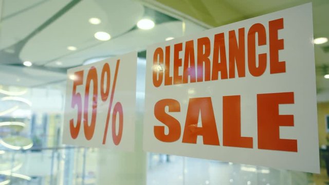 Clearance sale sign in shopping mall