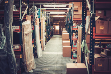Crates and boxes on a shelves in a warehouse
