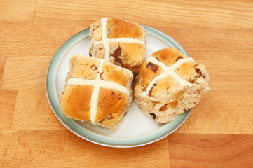 Hot cross buns on a table