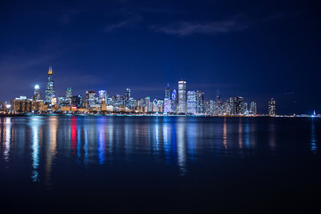 Fototapeta na wymiar Chicago skyline at night. View on Michigan lake and downtown Chicago. Illinois. USA
