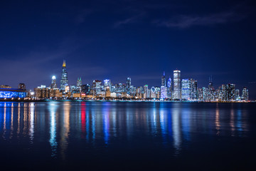 Chicago skyline at night. View on Michigan lake and downtown Chicago. Illinois. USA