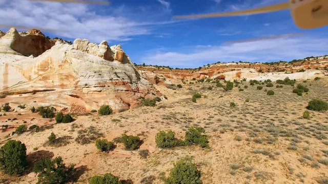 Drone flying through the desert crashing into cliff