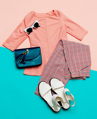 Stylish summer clothes. Vintage. Checkered trousers. Outfit