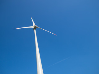 wind power plant and blue sky