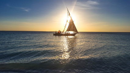 Sailboat at sunset Zanzibar