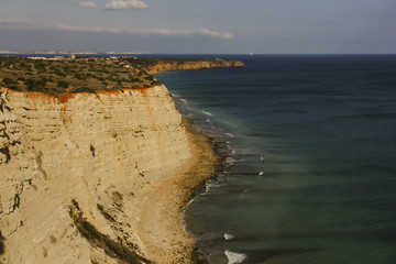 Cliff coast of the Algarve, Portugal in the evening sun