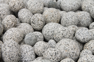 Round natural granite pebbles for construction and design