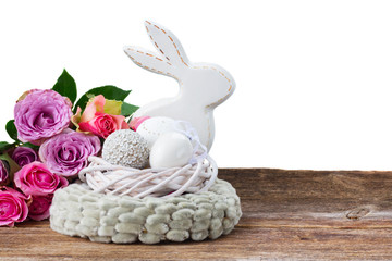 Easter eggs hunt - Bunny with nest of white eggs and roses border isolated on white background