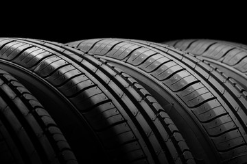 Car tires on black background