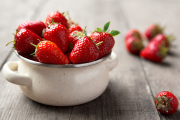 freshly picked strawberries in the bowl.
