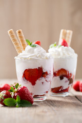 Strawberries sliced with whipped cream.