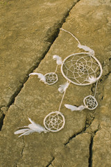 dreamcatcher in a dry land.Top view.Lay Flat.