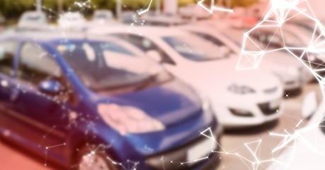 Cars in carpark with red overlay and white network