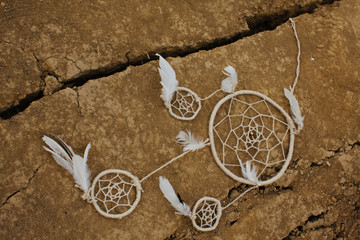 dreamcatcher in a dry land.Top view.Lay Flat.