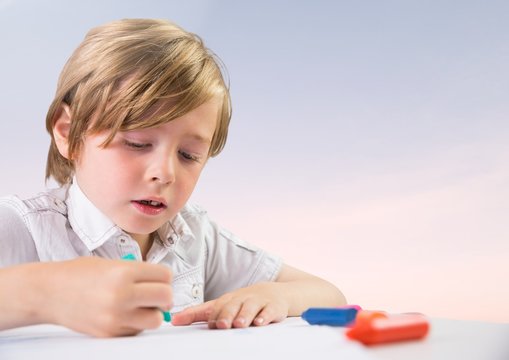 Young Boy Coloring With Soft Bright Background