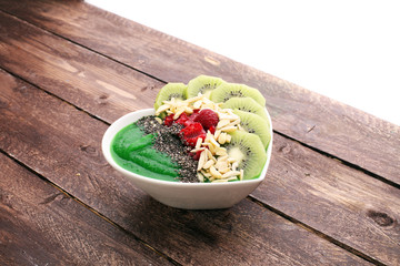 breakfast smoothie bowl with raspberries, kiwi and chia - diet concept