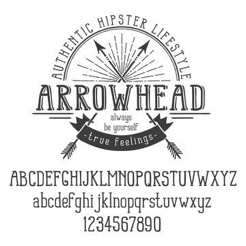 Hipster retro logo with crossed arrows and ribbon. And also the alphabet. Vector illustration.