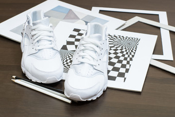 Modern sport shoes demonstrated in unique way with different objects