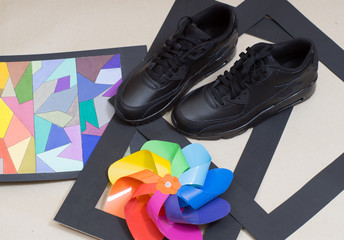 Modern sport shoes demonstrated in unique way with different objects