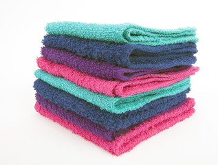 Front and side view of stacked washcloths. Isolated.