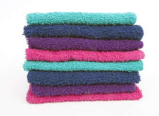 Front view of stacked washcloths. Isolated.