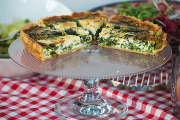 Traditional greek spinach pie, spanakopita, with goat cheese. Brunch in a restaurant