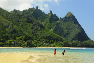 Haena Beach Kauai Hawaii 2 Girls Wading Bali Hai Makana Ridge Background