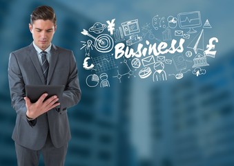 Businessman on tablet with Business text with drawings graphics