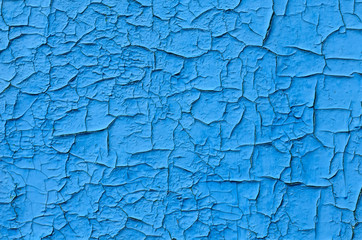 Texture of an old cracked paint. Pattern of rustic blue grunge material.