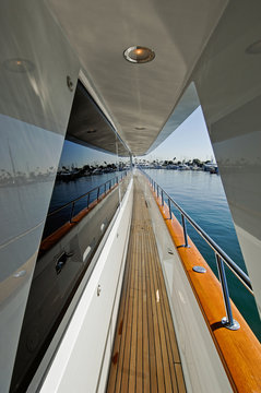 Graphic image looking down yacht walkway