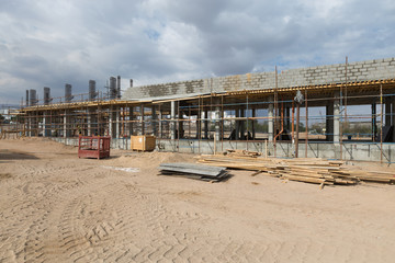 Fototapeta na wymiar Aqaba, Jordan, 10/10/2015, Terminal building and Foundation construction at the Aqaba new port