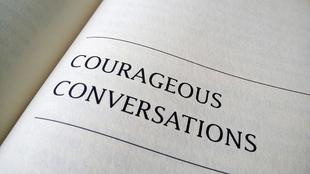 Courageous conversation printed on a book
