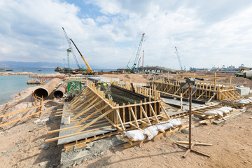 Aqaba, Jordan, 10/10/2015, Foundation construction at the Aqaba new port, using wood and steel.