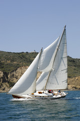 Fototapeta premium Classic sailboat and point loma lighthouse