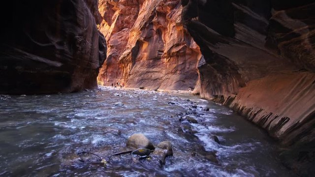 View of river flowing through Zion Narrows