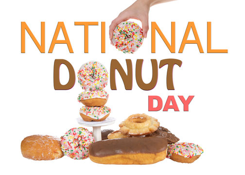Variety of Donuts isolated on white background, National Donut Day in June and November. Hand holding donut for O in National and stacked donut for O in Donut.