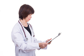 Asian female medical doctor with stethoscope reading report